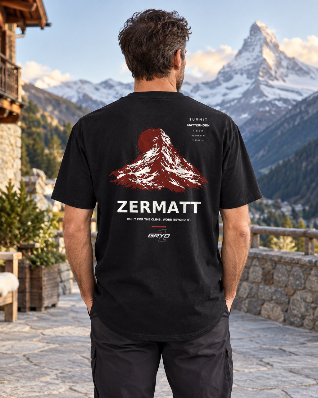 Person wearing a GRYD1 Summit Zermatt T-shirt in an alpine setting | Shared
