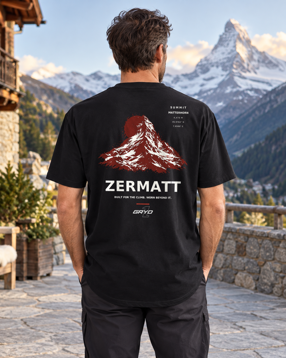 Person wearing a GRYD1 Summit Zermatt T-shirt in an alpine setting | Shared